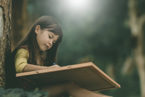 istock foreigner girl learning ,playing with happy in free time. 1159499651