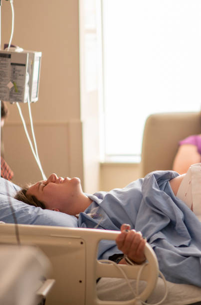 istock Young woman in childbirth 1159500442