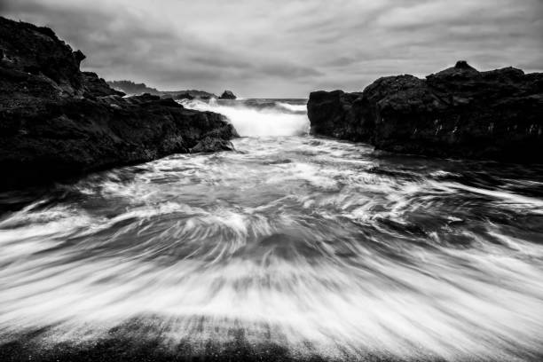 istock Black and White Surging Ocean under Storm Sky 1159501384