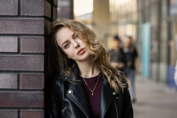 istock attractive curly blond girl 1159508008