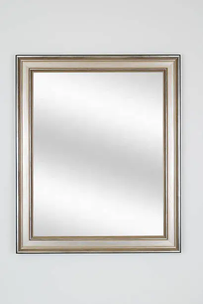 Picture frame in silver or pewter with digital mirror inserted, isolated on white background.