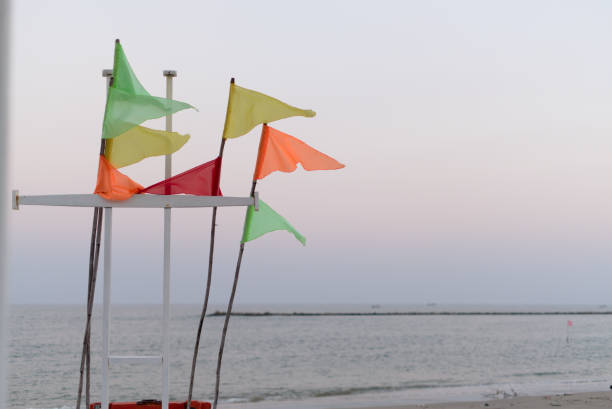 istock Colorful flags blown by the wind in the morning 1159515611