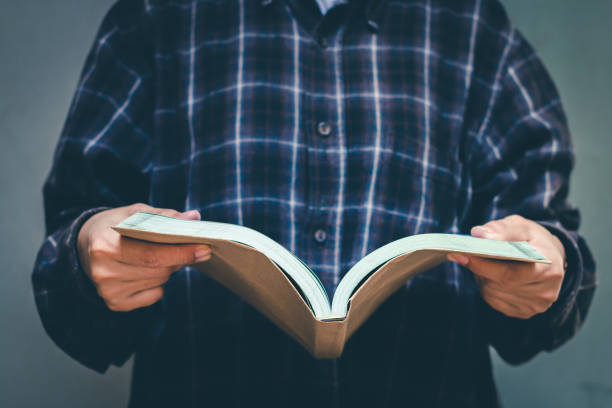 istock Women read holiday book in room quiet environment. 1159515714