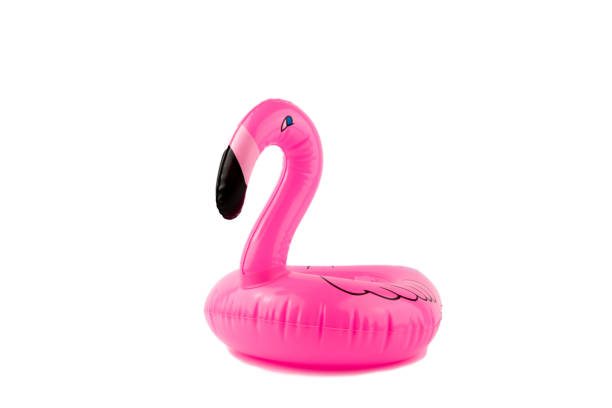 istock Giant inflatable pink flamingo on a white background. Pool float party. Summer concept. 1159517251