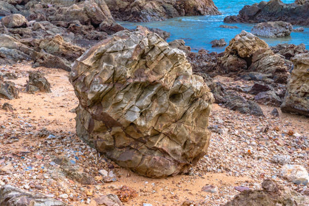 istock beautiful rock on the beach 1159518998