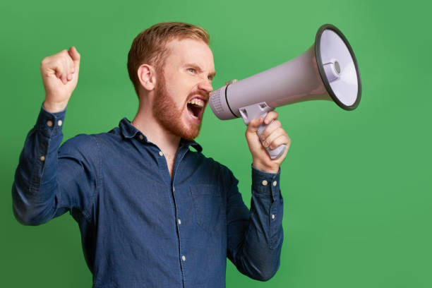 istock Propagandist shouting in loudspeake 1159519102