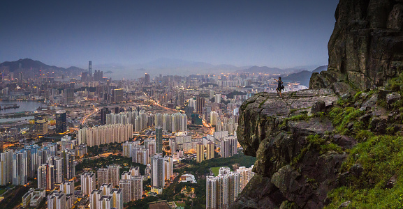 Panoramic aerial shot of the HongKong cityscape Skyline at sunset the famaus tourist place in Hong kong