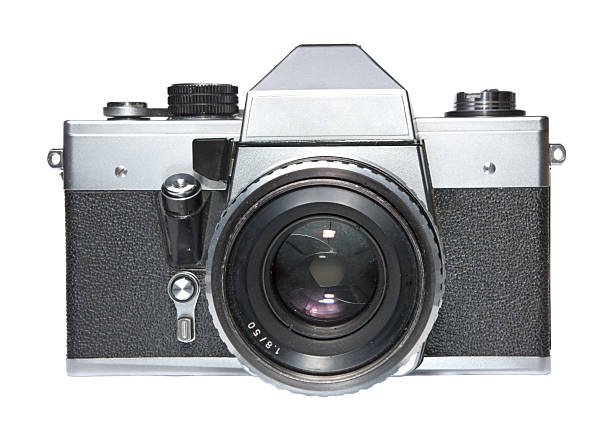 Vintage SLR film camera isolated on white Old styled vintage mechanical SLR film camera vintage camera stock pictures, royalty-free photos & images