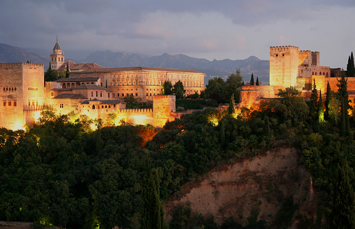 Granada, Spain - November 30. 2021 - Sunset above Alhambra moorish castle