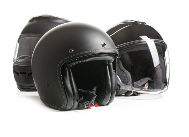 três capacetes pretos do motorcyle - helmet helmet visor protection black - fotografias e filmes do acervo