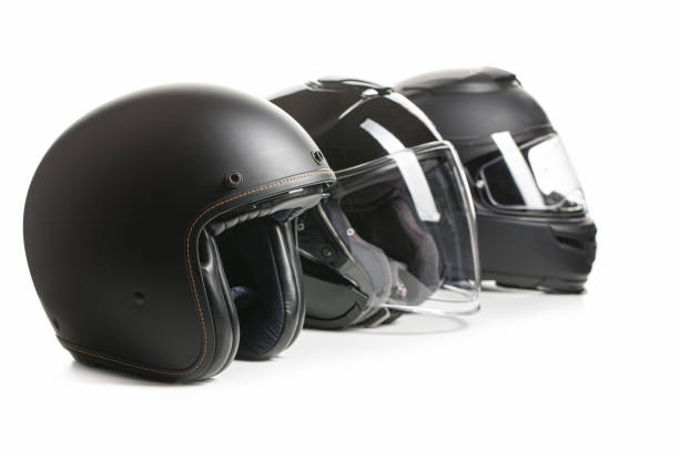 três capacetes pretos do motorcyle - helmet helmet visor protection black - fotografias e filmes do acervo