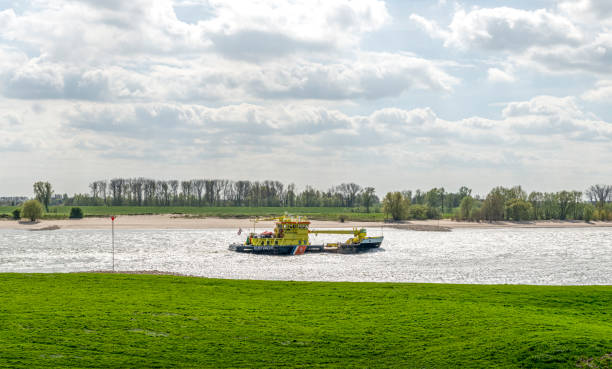 Dutch river coastguard on patrol on the river Maas, in the Netherlands.