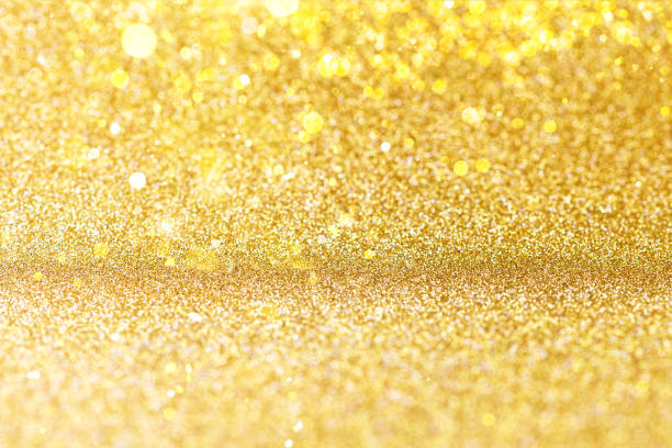 istock Gold Festive Christmas background. Abstract twinkled bright background with bokeh defocused golden lights. 1159535556