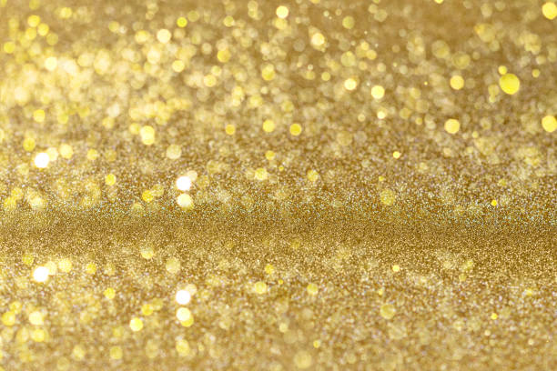 istock Gold Festive Christmas background. Abstract twinkled bright background with bokeh defocused golden lights. 1159535569