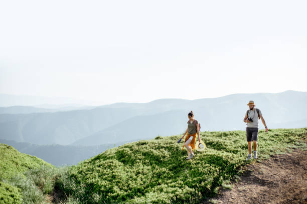 istock Couple traveling in the mountains 1159536731