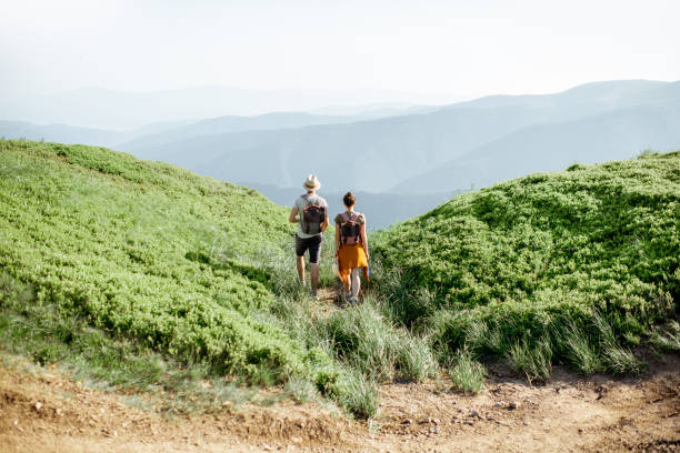 istock Couple traveling in the mountains 1159536742