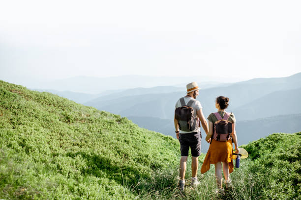 istock Couple traveling in the mountains 1159536772