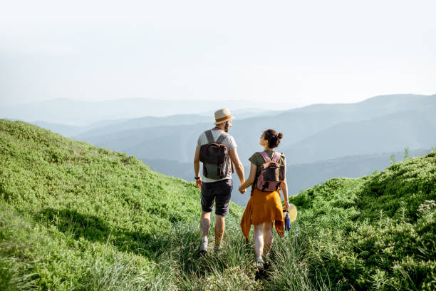 istock Couple traveling in the mountains 1159536790
