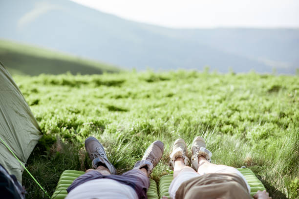istock Couple lying in the mountains 1159537092