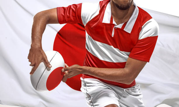 istock Rugby Player with ball and Japanese Flag 1159537860