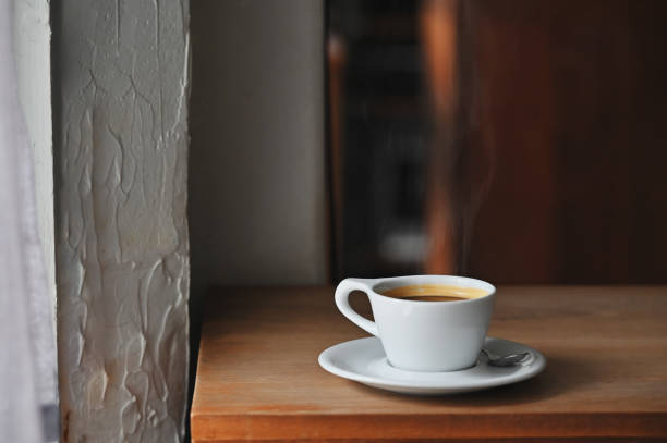 istock Coffee morning with black coffee on wooden desk. 1159538253