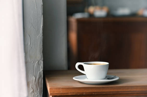 istock Coffee morning with black coffee on wooden desk. 1159538292