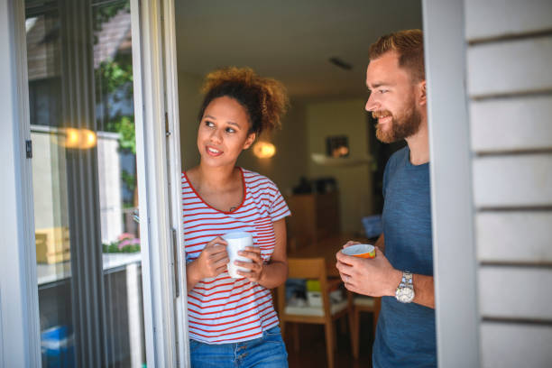 istock Millennial Couple Enjoying Coffee and Backyard View 1159539291