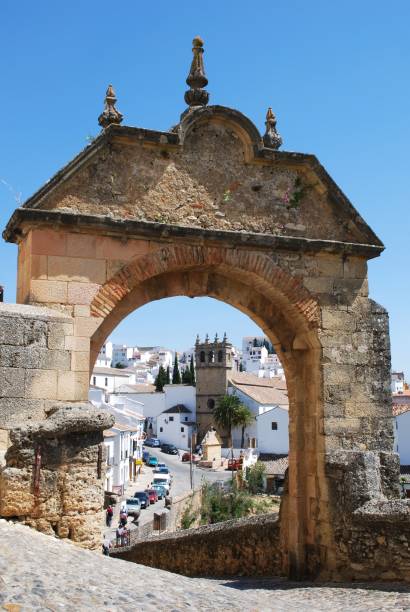 Philip V arch, Ronda, Spain. View through the stone Philip V arch towards the white town, Ronda, Malaga Province, Andalucia, Spain, Europe. prince phillip stock pictures, royalty-free photos & images