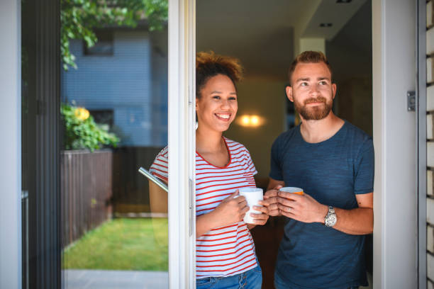 istock Millennial Couple Imagining Landscaping for the Backyard 1159539376
