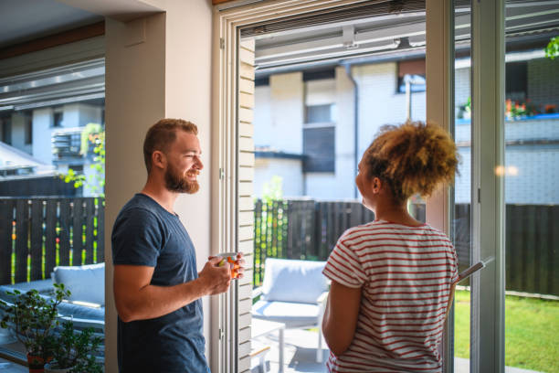 istock Millennial Couple Enjoying Coffee and Backyard View 1159539379