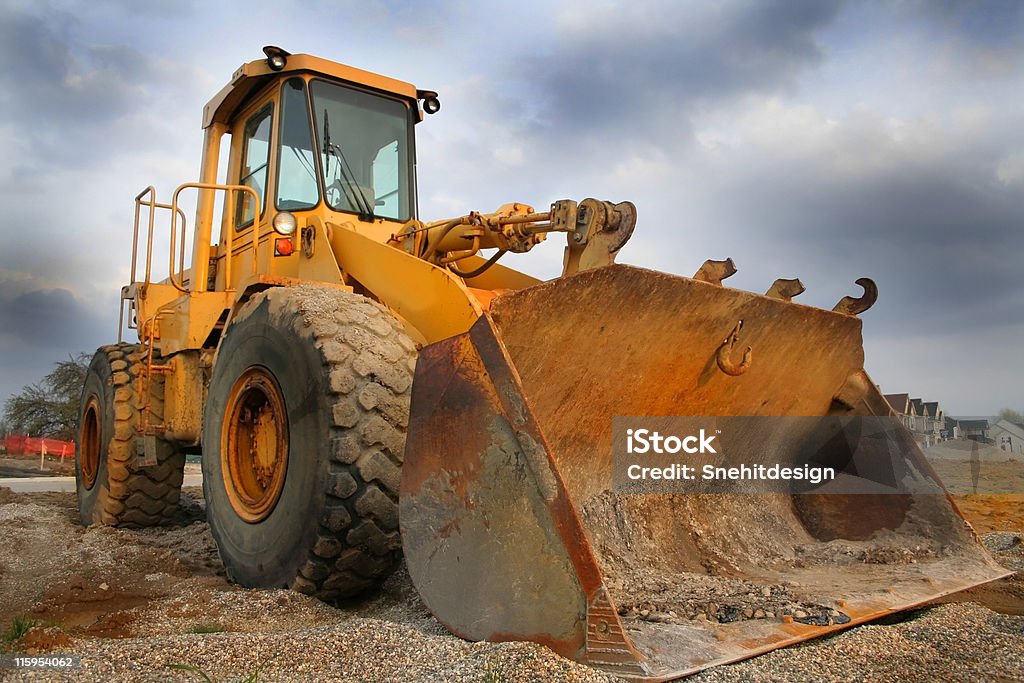 Construction Equipment Construction equipment with sky back ground on a new housing site Blue Stock Photo