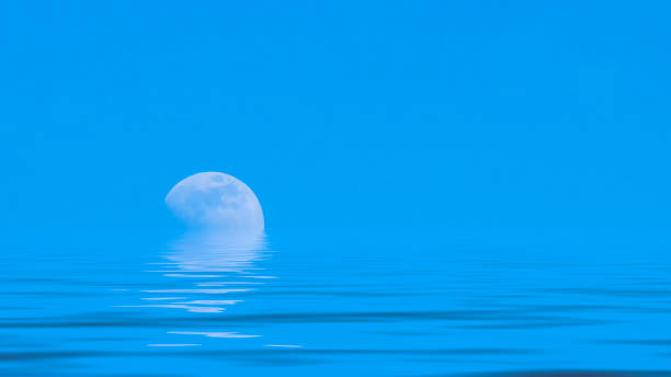 istock Moon over the blue wide sea 1159543992
