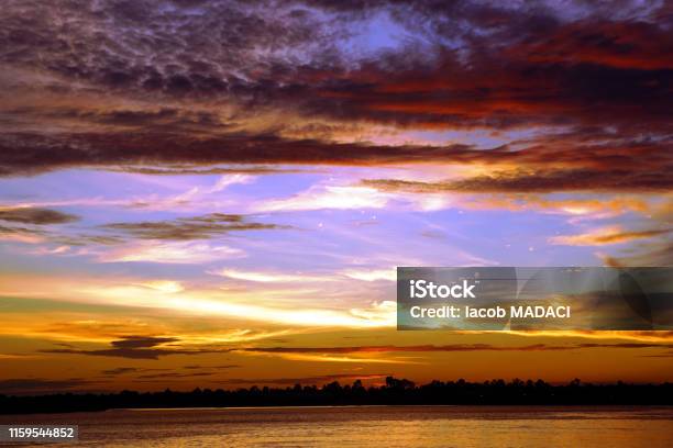 Sunset On The Rajang River In Sibu Malaysia Stock Photo - Download Image Now - Archipelago, Asia, Asia Pac