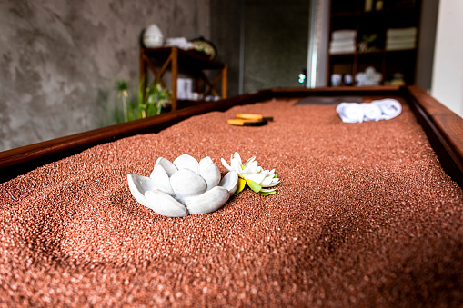 A warming backrest relaxation quartz bed in a health spa.