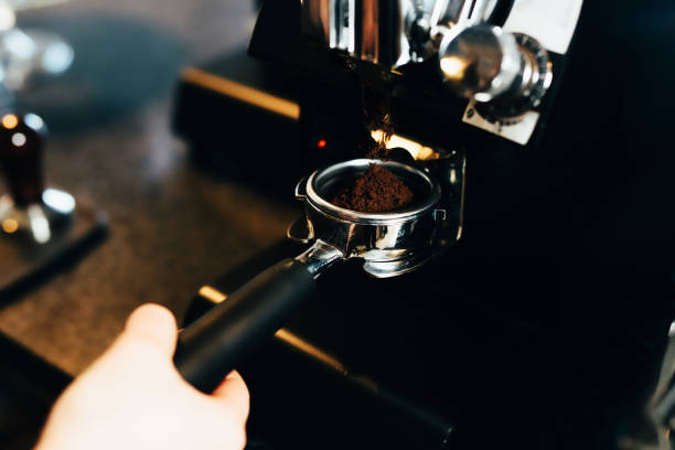 istock Barsita grinding coffe for espresso 1159547153