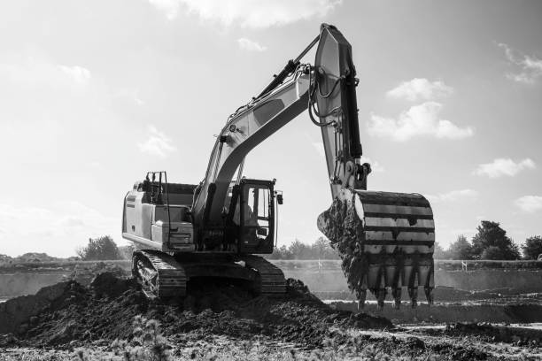 istock excavator on construction of new road 1159547470