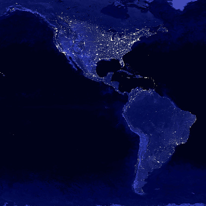 América del Norte y del Sur ilumina el mapa por la noche. Vista desde el espacio exterior photo