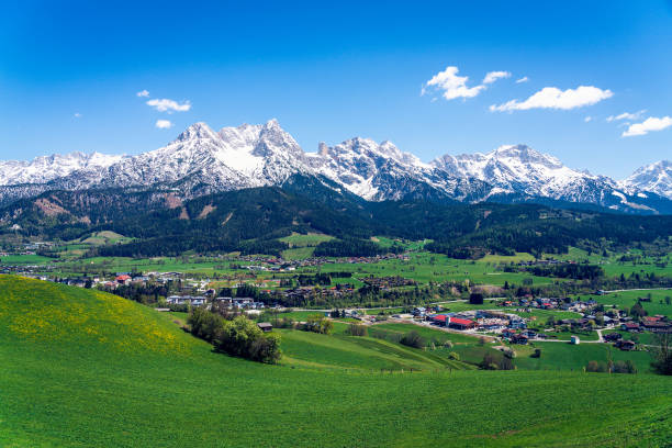istock Panoramic view from the hill next to Saalfelden and RItzen lake, Austrian alps. 1159553403