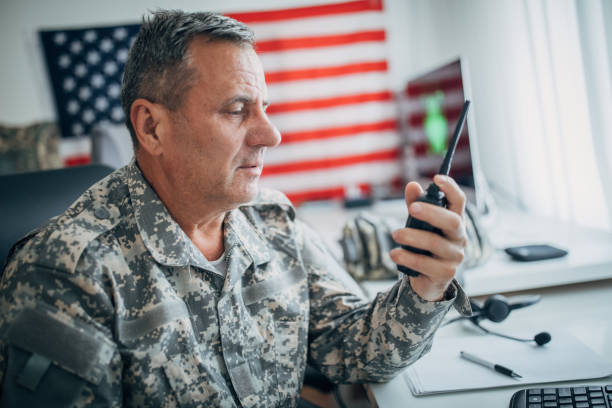 istock An old American soldier works in the office 1159553496