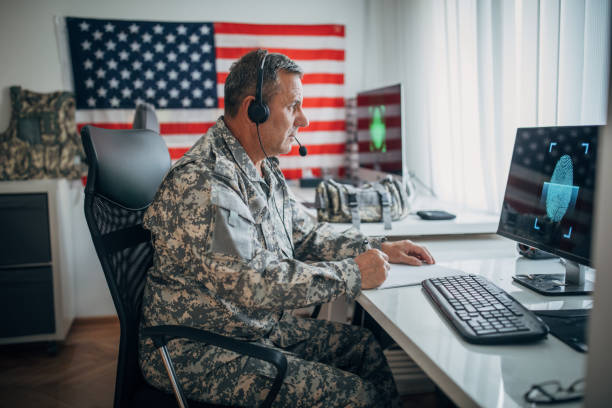 istock Senior soldier with headphones working 1159553642