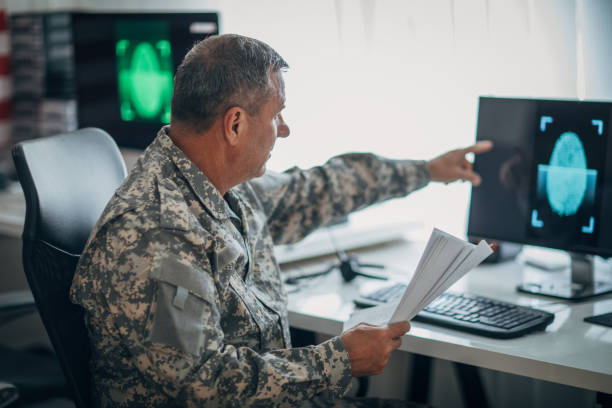 istock An old American soldier works in the office 1159553689
