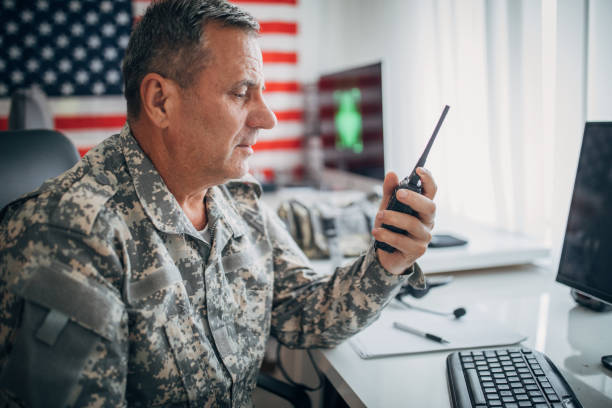 istock An old American soldier works in the office 1159553737