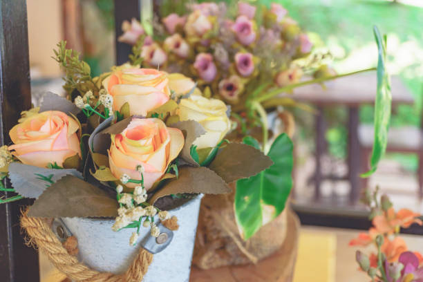 istock Plastic flower, Flowers in the restaurant, Artificial, charming, romantic, decoration, decoration, rosy face 1159555718