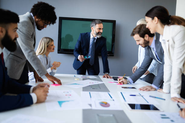 istock Creative business people working on business project in office 1159555744