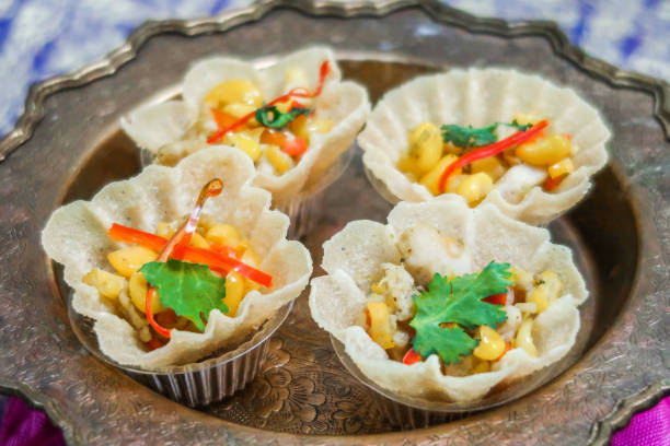 Minced chicken and sweet corn in crispy golden cup or Kratong thong stock photo