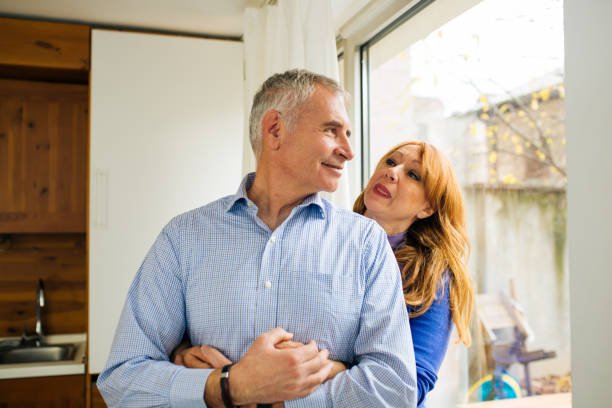 istock Happy mid aged couple enjoying the romance 1159559403