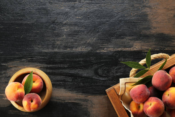 minimalistic bacground with ripe juicy nectarine peaches. - nectarine peach red market imagens e fotografias de stock
