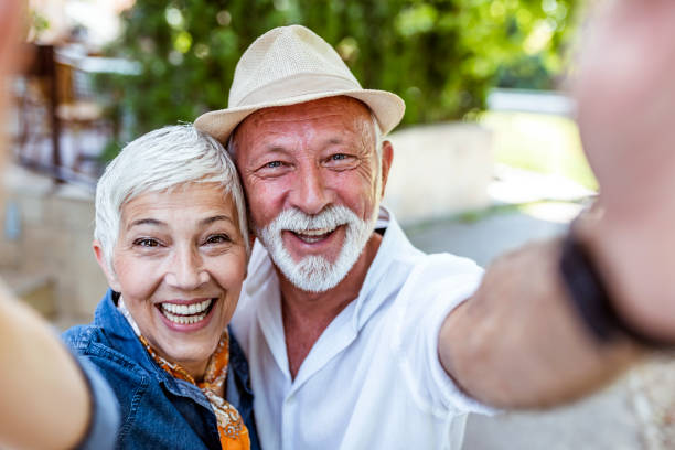 istock Senior tourist making selfie 1159560562