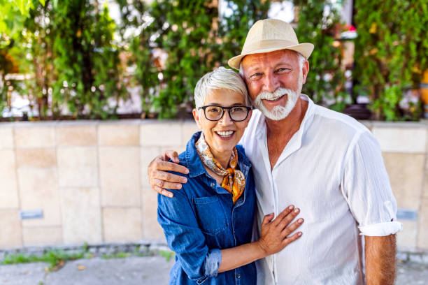 istock Happy white hair couple standing together 1159560721