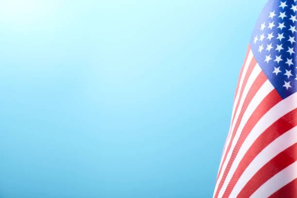 istock American flag on blue background with copy space. 1159561741